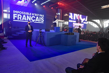 Far right presidential candidate Eric Zemmour flanked by security guards as he speaks at a rally in Burgundy. The rally was attended by 3500 people.