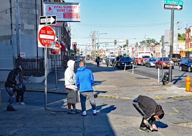 Opiate addicts injecting on the street in North Philadelphia, between Huntingdon and Allegheny on the elevated Market-Frankford subway. This is the epicentre of the city's opioid (fentanyl) drug crisi...