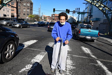 A man begs from passing traffic on a street in North Philadelphia, between Huntingdon and Allegheny on the elevated Market-Frankford subway. This is the epicentre of the city's opioid (fentanyl) drug...