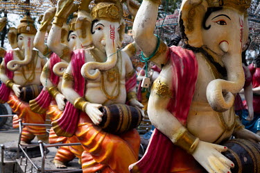 Statues of Ganesha lined up for a wedding procession outside Motihari.