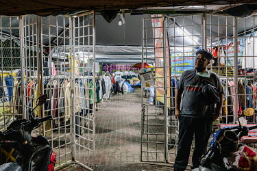 Muhammad Mat Nor the owner of Mad X Station bundle shop. He says business has been much slower since the pandemic. People in Malaysia use the term 'bundle' for secondhand shopping, a reference to the...