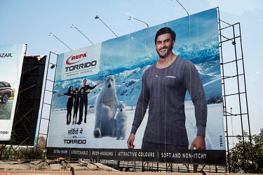 An advert for thermal underwear featuring a polar bear family.