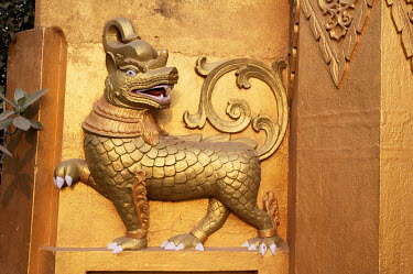 Golden dragon decoration outside a hotel.