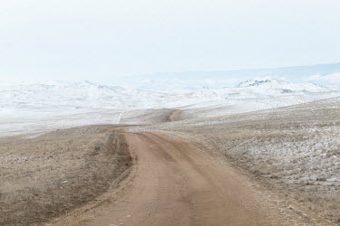 A road through the glacial steppes of Olkhon Island which has an unique ecosystem.