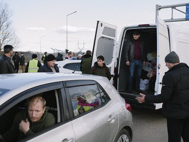 Refugees crossing from Ukraine at the Palanca border point. Thousands of people fleeing war in Ukraine have been welcomed in Moldova by self-organised groups of volunteers and groups who are providing...