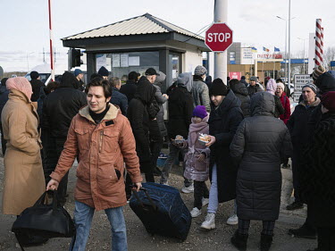 Refugees crossing from Ukraine at the Palanca border point. Thousands of people fleeing war in Ukraine have been welcomed in Moldova by self-organised groups of volunteers and groups who are providing...