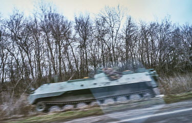 An Ukrainian army armoured vehicle at the roadside.