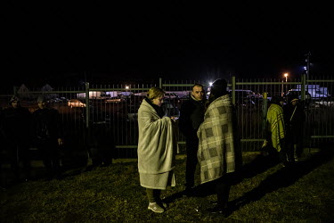 People fleeing the Russian invasion of Ukraine arrive on Polish soil after crossing the Medyka â�" Shehyni border point. Many Poles and expatriate Ukrainians have also travelled to Polish/Ukrainian b...