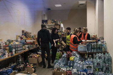 Polish and Ukrainian volunteers provide water, food and basic hygiene products to the refugees who have just arrived in Przemysl by train from Kiev (Kyiv) and Lvov (Lviv).