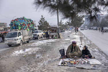 In the middle of the busy streets of Kabul, Pacha and his daughter Bebe Aisa are trying to earn enough money to buy for the day by cleaning and polishing shoes. They charge five Afghani for each pair...