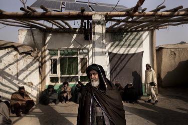 Men gathered in front of a mosque in Cha Rahe Qamber, a suburb of Kabul.