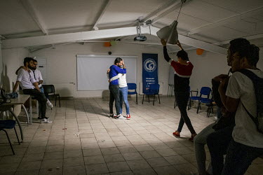 Wissam (centre), at his goodbye party at a support centre for LGBT+ asylum seekers and refugees near Taksim Square.  Wissam is a gay Syrian man who participated in the 2016 Mr Gay Syria contest, and a...