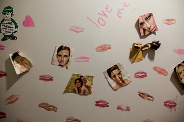 Lipstick kisses and magazine cut outs of female faces stuck on Merjan's fridge in the western Turkish city of Isparta. Merjan, who was transgender, died in 2014 after her HIV developed into AIDS and s...
