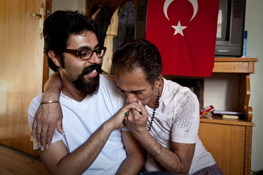 Reza (L, 29), and Khosro (R, 47) from, Tehran, Iran. Reza and Khosro came to Turkey together nine months ago, after family and friends found out about their relationship. They both say that their fami...