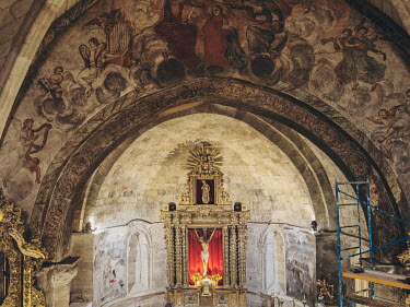 Fresco paintings on the archway over the altar and nave in the Iglesia de Santa Maria del Castillo, a 13th century Romanesque church in the village of Castronuno.