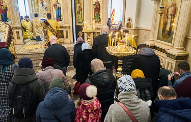 Worshipers praying for peace in Ukraine during Sunday Mass at Dnipro Diocese of the Orthodox Church of Ukraine.