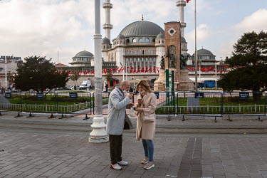 Foreign tourists in Taksim Square, during a nationwide weekend coronavirus curfew which didn't appear to apply to overseas visitors.