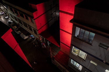 Small clothing factories in Nancun at night.
