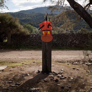 A discarded life vest used by informal migrants who recently smuggled themselves across the Aegean Sea from mainland Turkey to Greece.