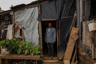 Jose Roberto de Jesus, leader of the Boa Esperanca encampment in Vila Rio Pardo, stands in the door of his shack. The camp was set up last year by landless families who were removed from an area of la...