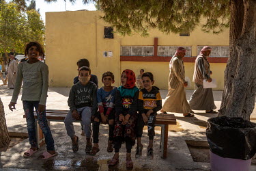 Children playing and waiting outside a hospital, which was restored to working order by the Turkish government-linked organisation AFAD (Disaster and Emergency Management Presidency).