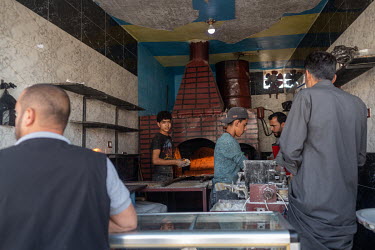 A bakery during work hours in the centre of Tel Abyad, which has come under the control of various rival groups since the start of the conflict in 2011. From the Syrian regime, to Kurdish forces, Russ...