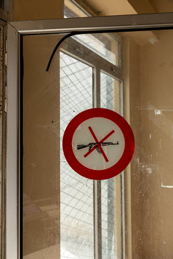 A 'no weapons allowed' sign at the entrance of the Tel Abyad hospital.