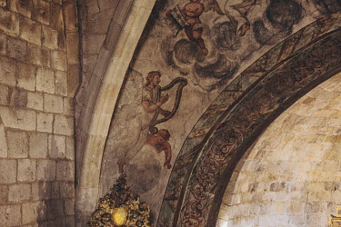Frescoes decorate the main arch of the Iglesia de Santa Maria del Castillo, a 13th century Romanesque church in the village of Castronuno.