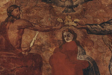A partially restored fresco painting on the main arch of the Iglesia de Santa Maria del Castillo, a 13th century Romanesque church in the village of Castronuno.