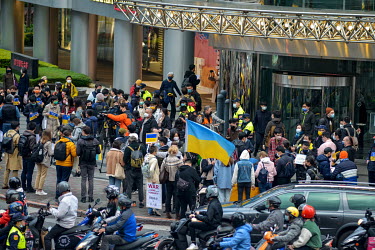 People at a pro-Ukraine rally held outside the Russian representative office following the news that overnight president Putin had ordered a full-scale invasion of Ukraine.