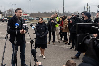 At the Medyka border crossing point, between Poland and Ukraine, British Home Secretary Priti Patel (R) gives a statement about the UK's response to the Ukrainian refugees fleeing to Europe.
