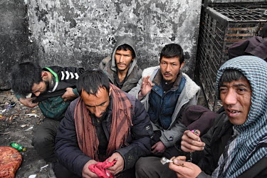 Drug users gather beneath the Pul-e-Sukhta  bridge on the banks of the Paghman river, a few kilometres outside the centre of Kabul.   The drugs of choice are crystal meth, opium and heroin which are m...