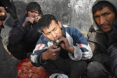 Drug users gather beneath the Pul-e-Sukhta  bridge on the banks of the Paghman river, a few kilometres outside the centre of Kabul.   The drugs of choice are crystal meth, opium and heroin which are m...