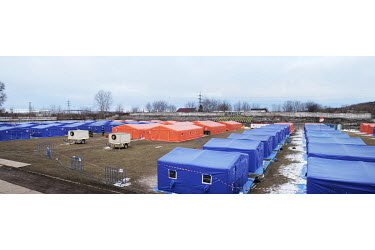A refugee camp set up inside the city's stadium. The camp can host about 400 people and is run by the Romanian Fire Brigade and is a military zone.