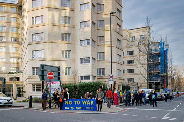 A banner with the slogan 'No To War, No To Fossil Fuels' during a solidarity protest against the Russian invasion of Ukraine, outside the London offices of Russian state oil giant Gazprom.