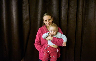 Marina with her baby Nadia. She is from Severodonetsk and, with the help of friends, escaped the war and found shelter in the Dnipro Business Apartments. She did not have time to pack her belongings,...