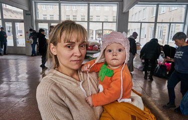 Yula with her eight-month-old daughter Ira at one of the city's humanitarian centres. Her family of three arrived in Dnipro from Kharkiv the night before. SHe says they would like to rest for a while,...