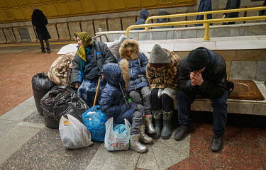 A family, who already fled fighting in their home town of Volnovakha, shelter in the Metalurhiv metro station with all their belongings after three missiles hit Dnipro that morning. They said they don...