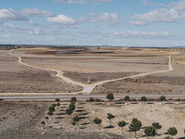 The view north across agricultural land from a small hill adjacent to the Ermita del Cristo de Villajos, a church close to the town of Campo de Criptana.