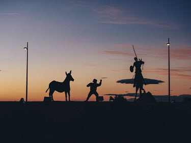 Statues of Don Quixote, Sancho Panza and his donkey, on a roundabout on the outskirts of Campo de Criptana.