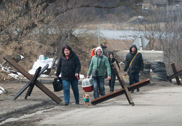 Civilians, near Hnativka, after crossing the River Irpin into Ukranian contolled areas west of Kyiv.