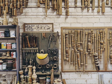 Woodworking tools and wooden carvings on the wall of the workshop of carpenter Pablo Rubio-Quintanilla in Campo de Criptana. Mr Rubio-Quintanilla is the uncle of writer Ana Iris Simon.