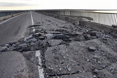 A road damaged when rocket has hit the highway just before the bridge leading out of Odessa to Mikolaiv.