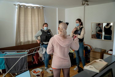 Constable Joanna Nowakowska (left) and Acting Sergeant Florina Rus (right) visit a sex worker, 'Anna', to check on her living and working conditions. Through these 'welfare' visits the Modern Slavery...