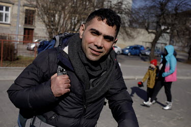 Omid, an Iranian man living in Denmark who volunteered to fight against the Russians in the Ukrainian International Legion, arrives at the train station on his way over the border.