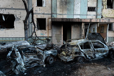 Burned out cars outside a high rise civilian, residential estate in the Sviatoshynskyi district of Kiev that was targeted by Russian shelling, causing serious damage throughout the estate.