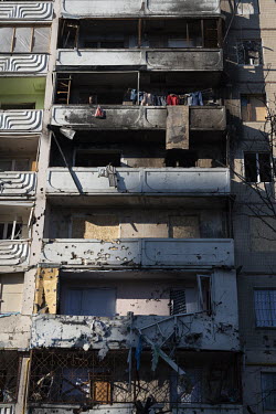 A badly damaged residential apartment block, one of several civilian, residential areas of western Kiev that were targeted by Russian shelling over several days in the third week of Russia's invasion...