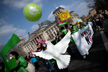Demonstrators from Greenpeace and from the Fridays For Future movement hold a Peace Pigeon sign at a rally of students from the global Fridays For Future movement and against the Russian war in Ukrain...