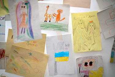 Children's drawings in the children's play area at the arrivals centre at the Hauptbahnhof, the railway station where Ukrainian refugees disembark trains from Poland.