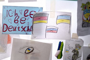 Children's drawings in the children's play area at the arrivals centre at the Hauptbahnhof, the railway station where Ukrainian refugees disembark trains from Poland.